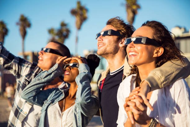 NASA claims that conventional sunglasses are not safe to look through, regardless of how black their lenses are.